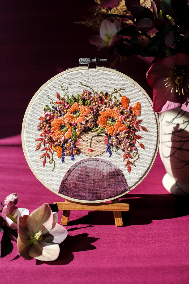 Embroidery Hoop Art | Brown-haired Lady with Hellebores – Elena Caron